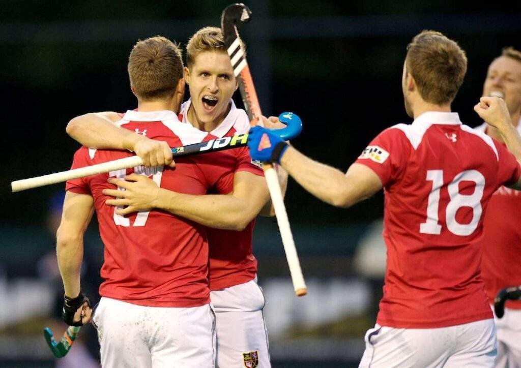 Promising Signs For Resumption of Hockey Following Government Announcements 3 Nick Bandurak celebrates with Barry Middleton
